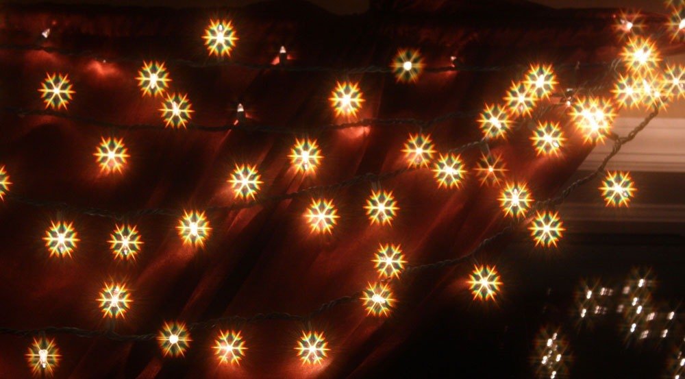 HolidayEyes glasses with house lights to enhance holiday ambiance