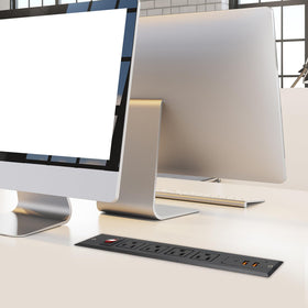 4 LEAF lifestyle office setup showing built-in power strip improving organization