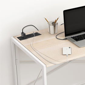 4 LEAF compact multi-device charging solution on a desk