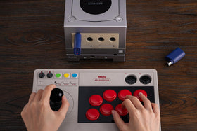 8BitDo receiver in a living room gaming setup showing convenience and neat wiring