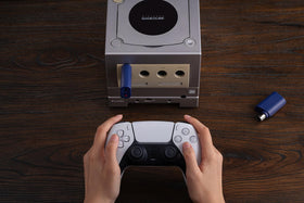 8BitDo receiver connected to Windows laptop USB port for PC compatibility benefit