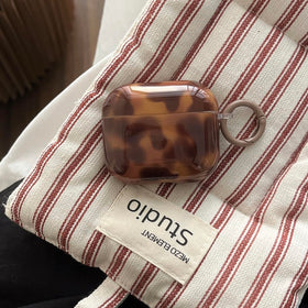 Aaknhen AirPods case with ring attachment for easy carry