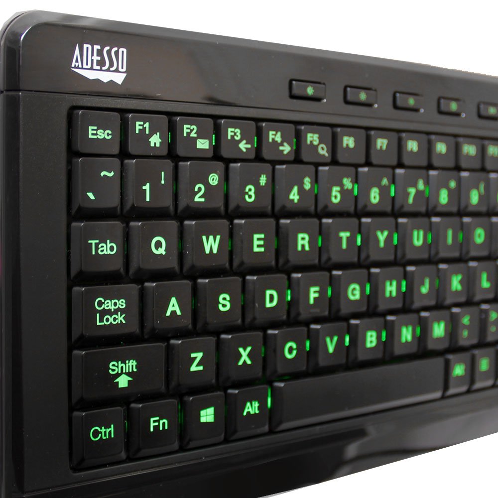 Adesso keyboard in use on a desk with laptop to boost productivity and comfort