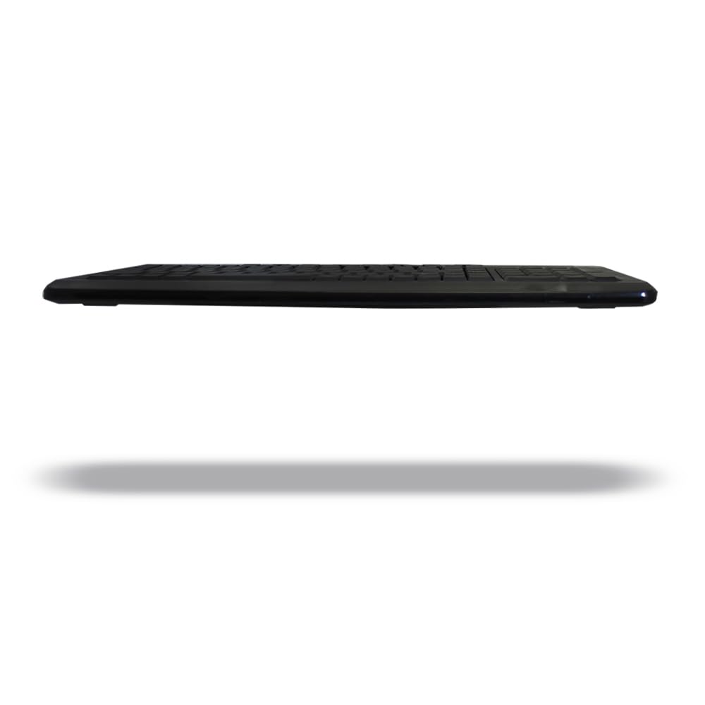 Adesso keyboard beside a ruler for scale to demonstrate compact footprint