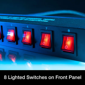 Close-up of illuminated switches on ADJ PC100A for easy visibility