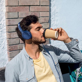 ADOOPE headphones worn during calls or gaming for clear voice and audio.