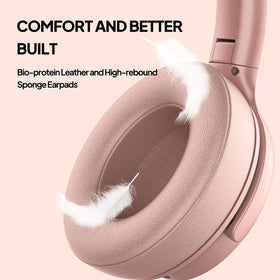 ADOOPE folded headphones beside included carrying bag for compact travel and protection