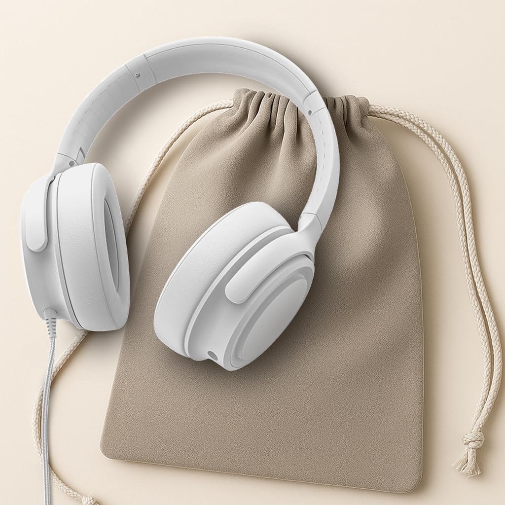ADOOPE headphones on desk with laptop showing practical work or gaming setup