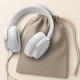 ADOOPE headphones on desk with laptop showing practical work or gaming setup