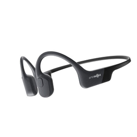 AfterShokz Aeropex Mini open-ear design shows sound delivery with ears free for awareness
