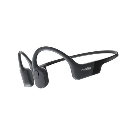 AfterShokz Aeropex Mini open-ear design shows sound delivery with ears free for awareness