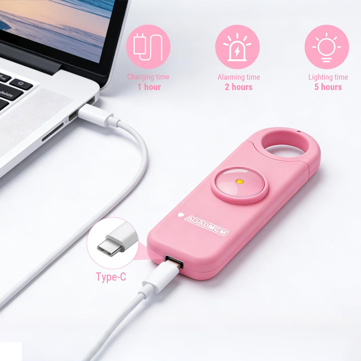 Compact AGADMCM alarm on a keychain; easy access during travel or emergencies.