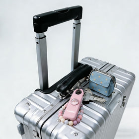 Lightweight, portable, and attachable to bags or purses.