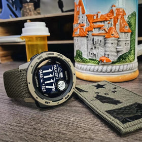 AHXLL band mounted on Garmin Instinct on wrist demonstrating stable fit