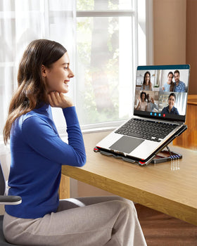 AICHESON pad next to 17.3-inch laptop for scale showing full compatibility benefit