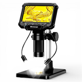 Aikokkl front view showing scope and coin, clear inspection benefit