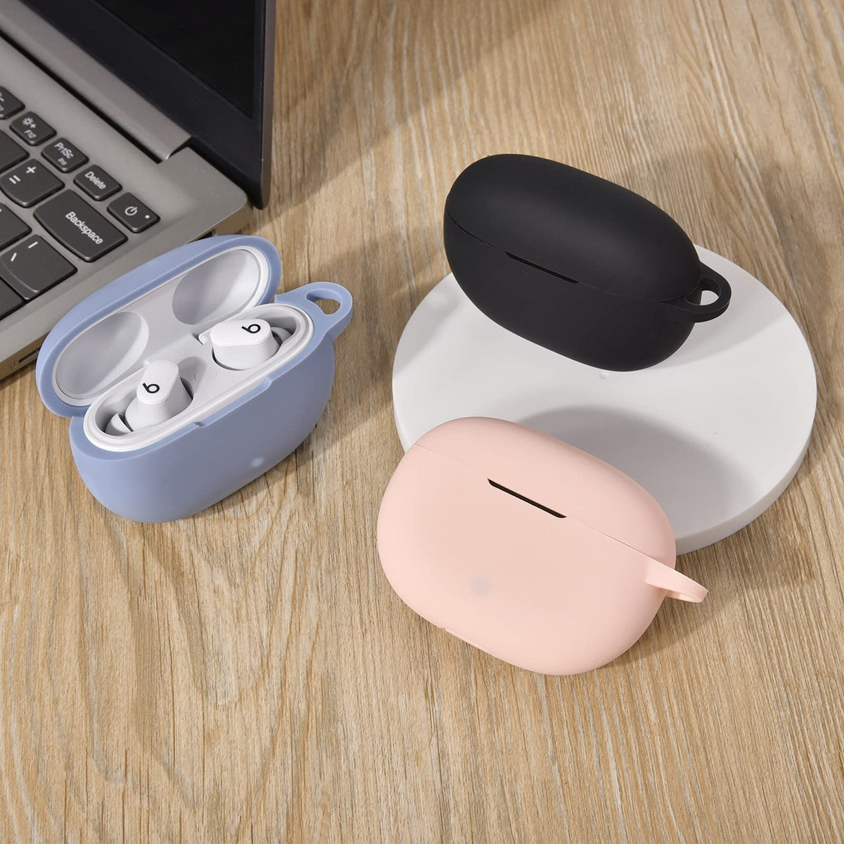 AIRSPO on desk beside phone showing everyday style and protection benefit