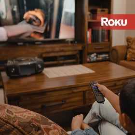 Aiwa portable DVD player includes FM radio for local stations on the go.