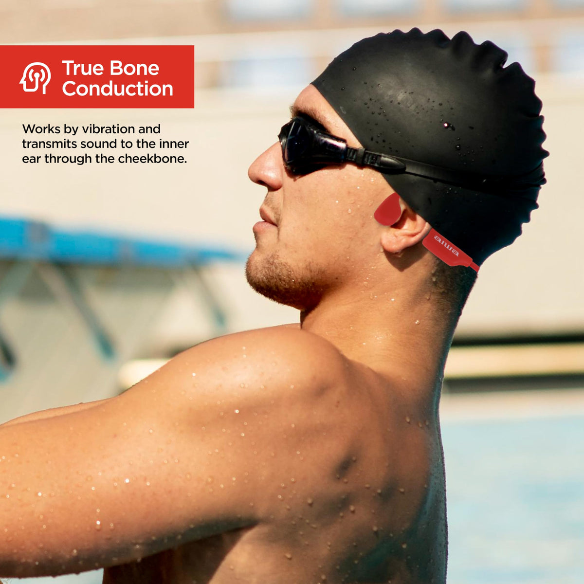 Aiwa Prodigy Swim on runner in red, illustrates secure fit and open-ear safety