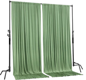 AK TRADING CO. Sage green backdrop close-up edge showing serged finish.