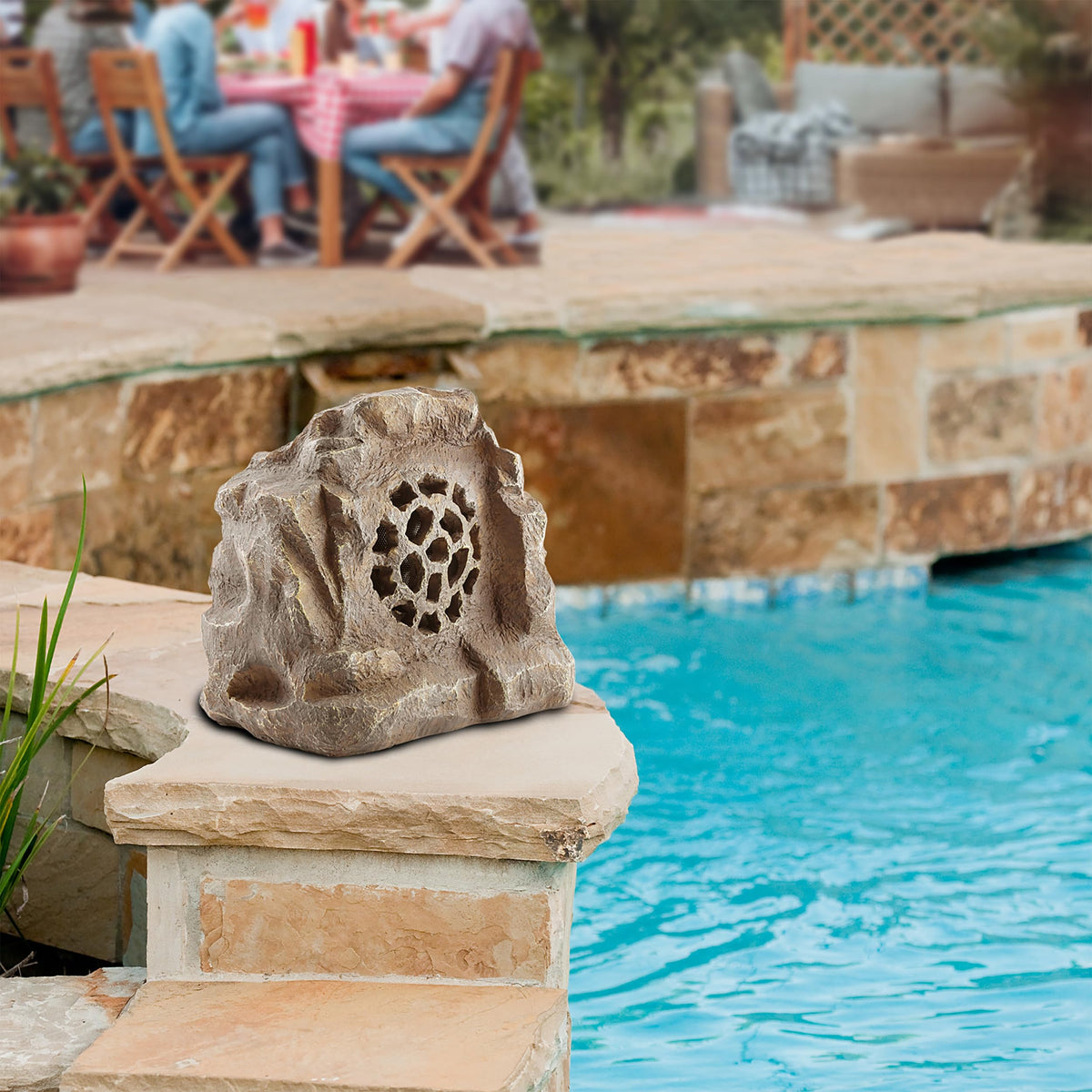 Alpine rock speaker weatherproof resin construction withstands rain and sun