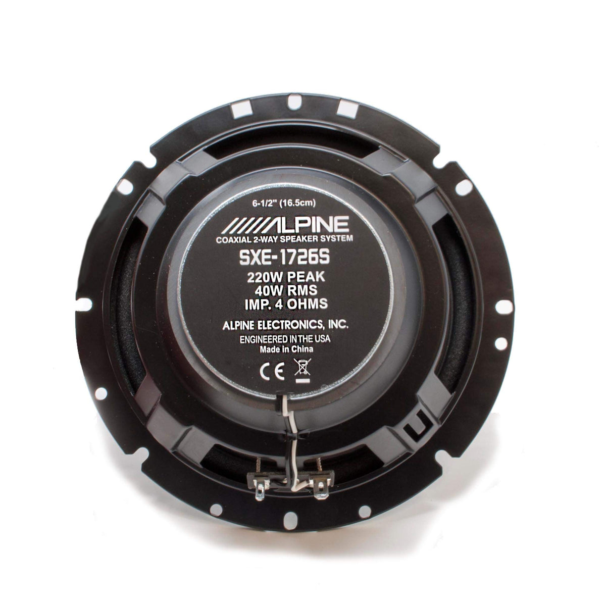 Alpine SXE-1726S installed in car door illustrating compact fit and impact