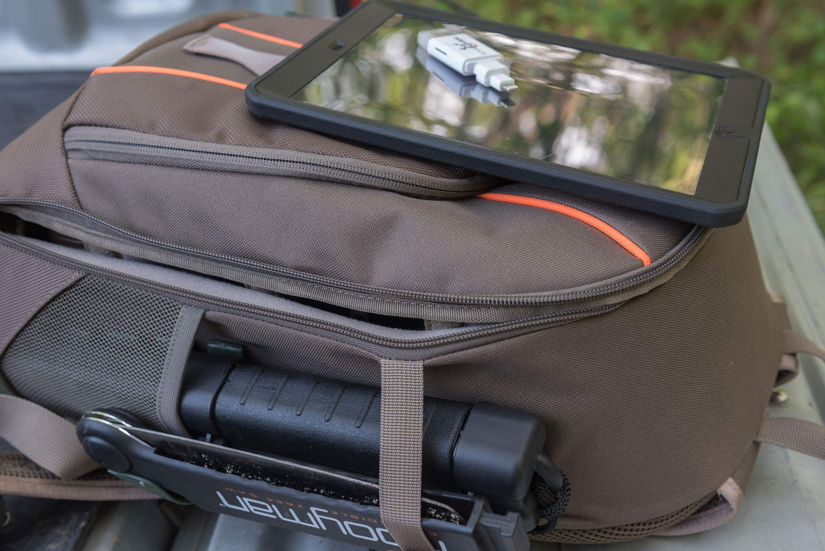 Padded shoulder straps and back panel cushion long carries.