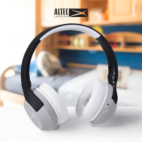 Altec Lansing child wearing headphones in car demonstrating noise reduction