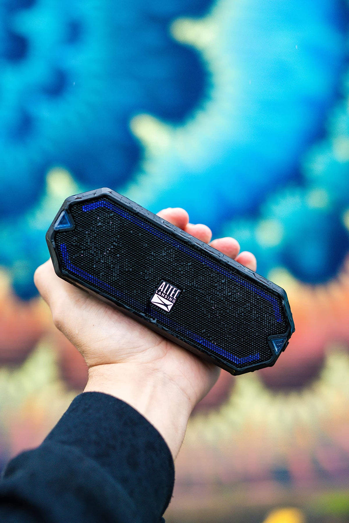 Built-in phone charger keeps devices powered while you listen.