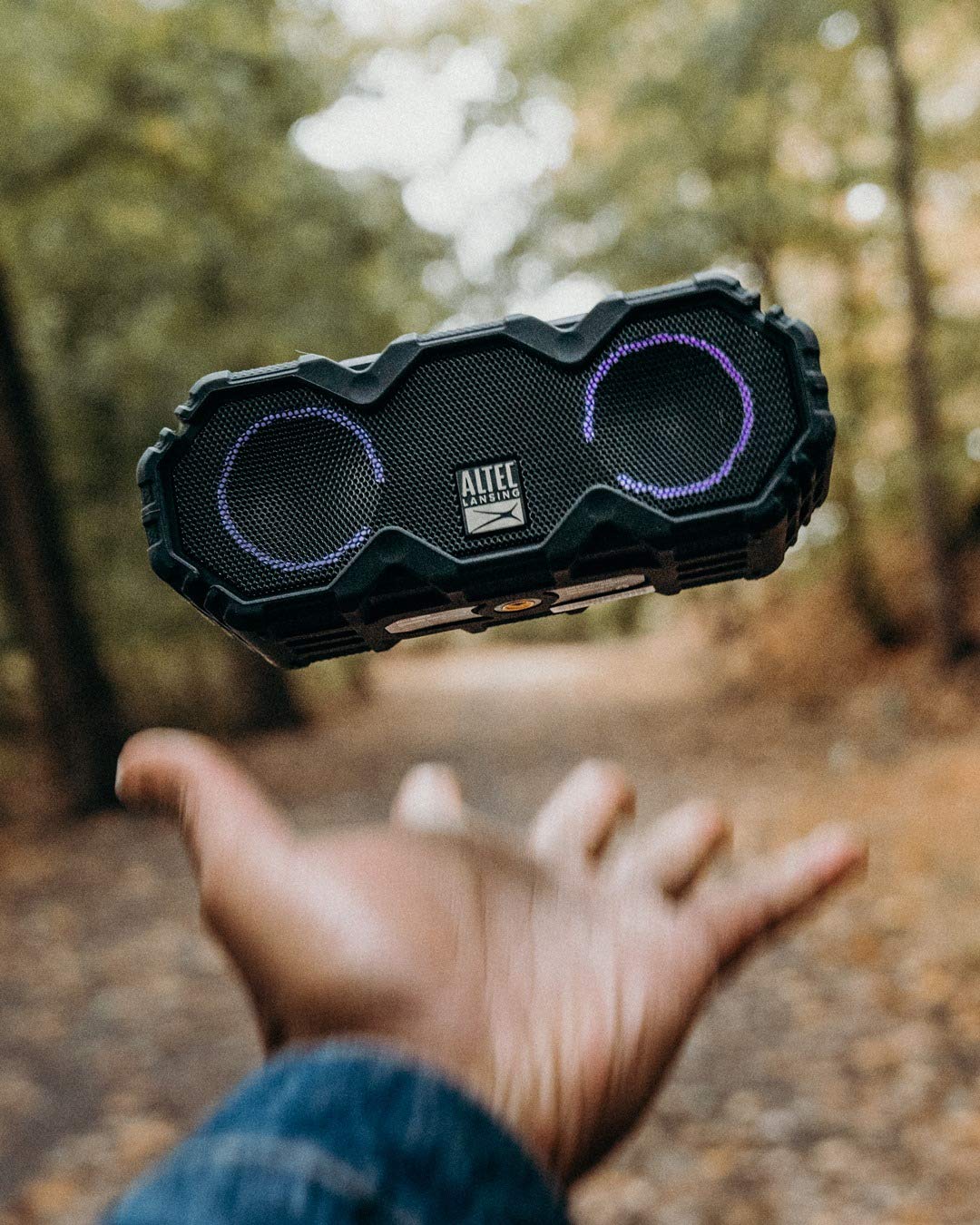 Altec Lansing packed inside a backpack showing lightweight portability for travel
