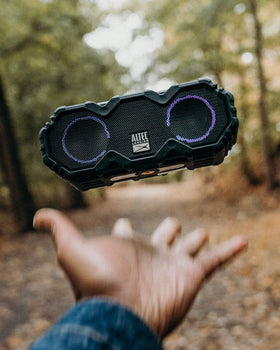 Altec Lansing packed inside a backpack showing lightweight portability for travel
