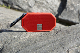 Altec Lansing Mini H2O at campsite during dusk, demonstrating durability