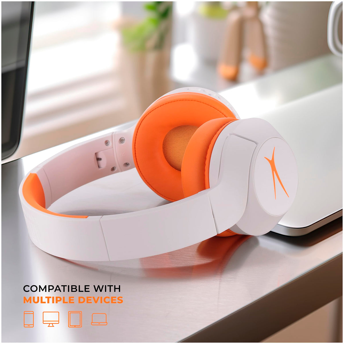 Altec Lansing beside book showing size and kid-friendly scale benefit