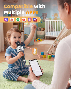 Amazmic microphone held by a child demonstrating comfortable size and portable entertainment