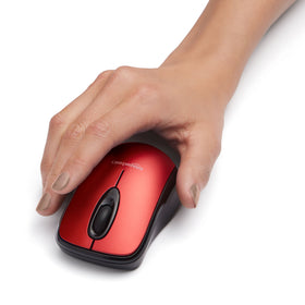Amazon Basics red wireless mouse in use on a laptop, 2.4 GHz connection for reliable wireless use.