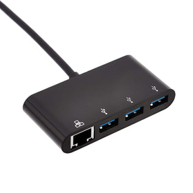 Amazon Basics USB hub on desk setup provides instant device expansion for peripherals