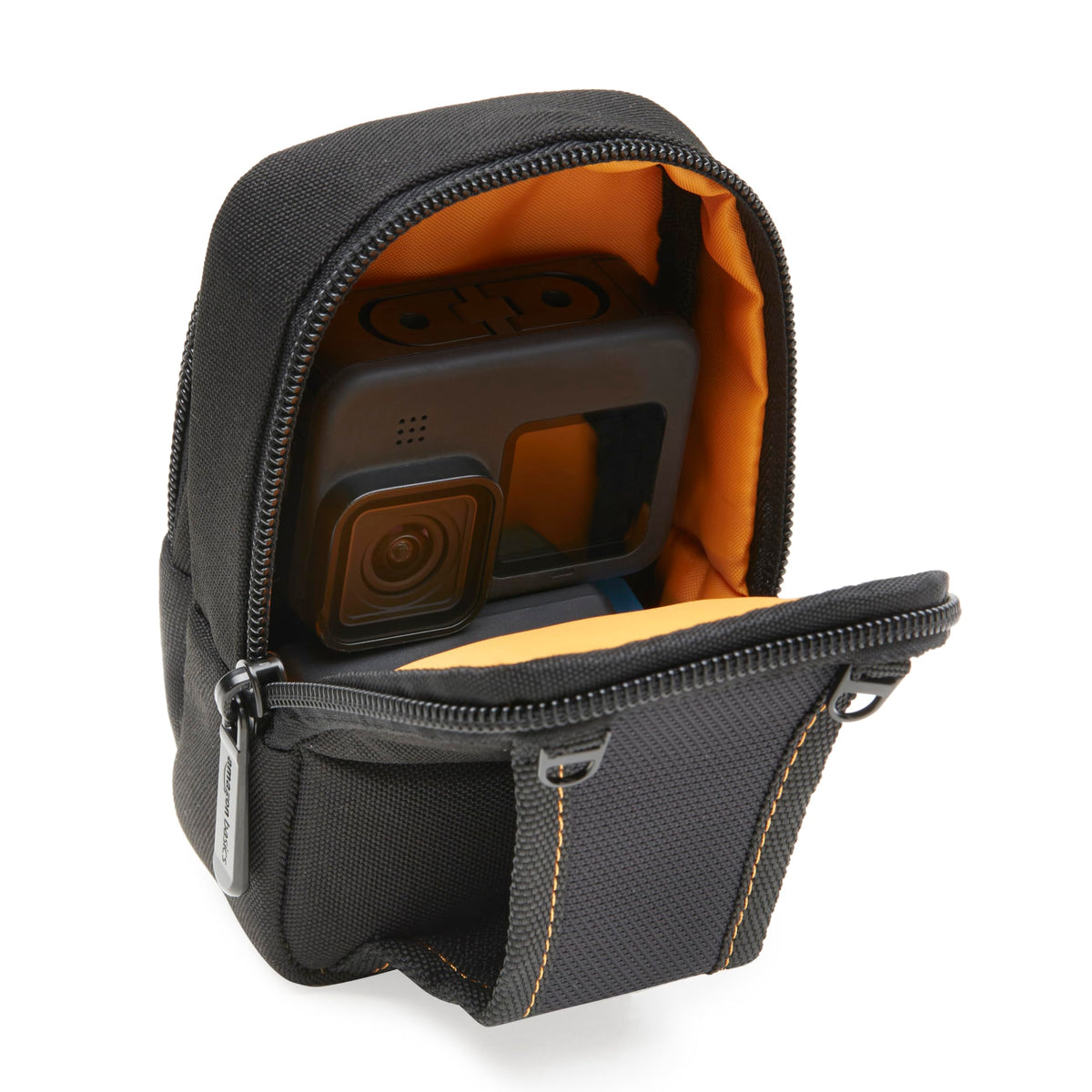 Amazon Basics in-use shot demonstrates compact camera fit and portability.