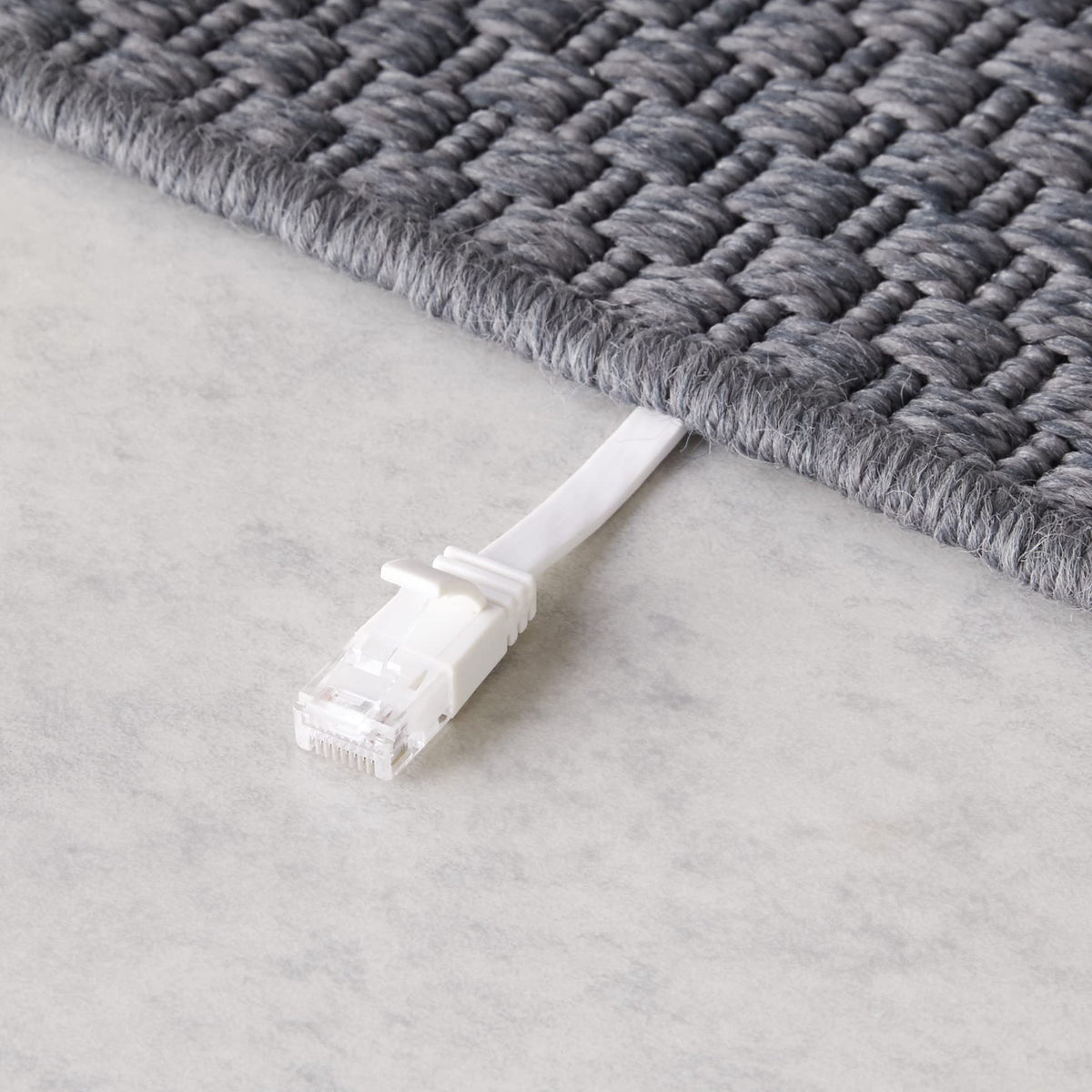 Amazon Basics Cat 6 cable used in indoor/outdoor style setup for routers.
