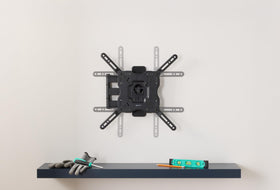 Amazon Basics compact behind-the-TV profile for tidy living spaces