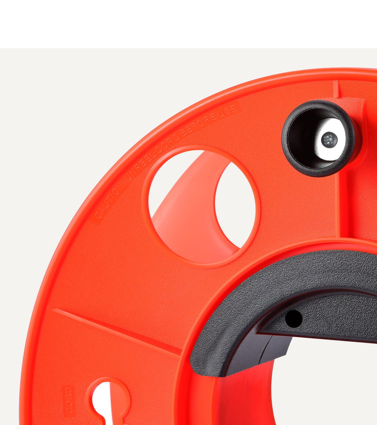 Amazon Basics Extension Cord Reel features center ergonomic handle for smooth reeling.