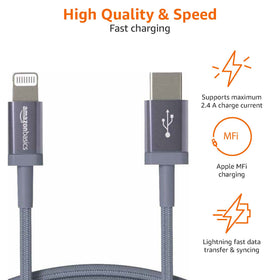 Amazon Basics PD fast-charging setup with compatible charger and iPhone.