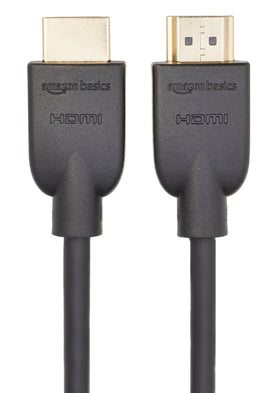 Amazon Basics cable connected between streaming box and TV for clear 4K picture benefit