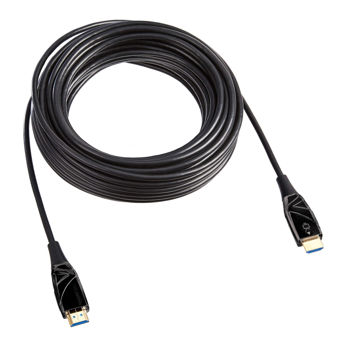 Amazon Basics cable connected between streaming player and TV demonstrating reliable 4K transmission