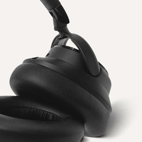 Amazon Basics retractable headband adjustment showing secure fit for different heads