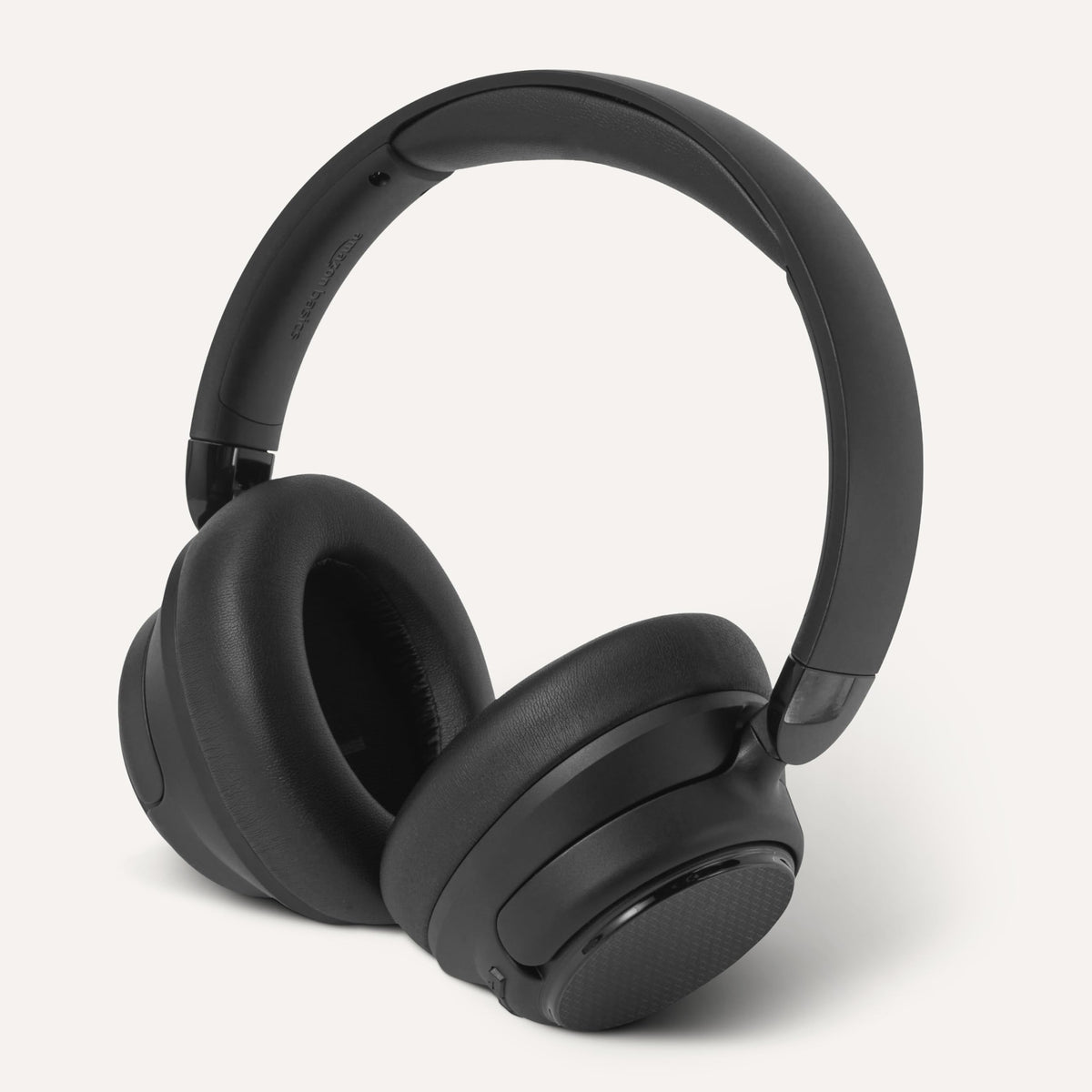 Amazon Basics headphones connected by 3.5mm cable for wired playback when needed