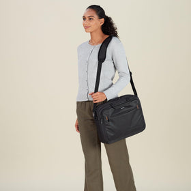 Amazon Basics laptop bag with adjustable strap offers versatile carrying options.