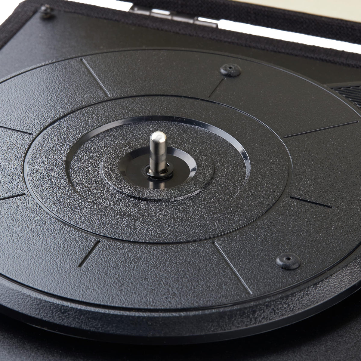 Amazon Basics on coffee table with vinyl for lifestyle listening enjoyment and compact footprint benefit