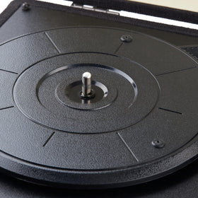 Amazon Basics on coffee table with vinyl for lifestyle listening enjoyment and compact footprint benefit