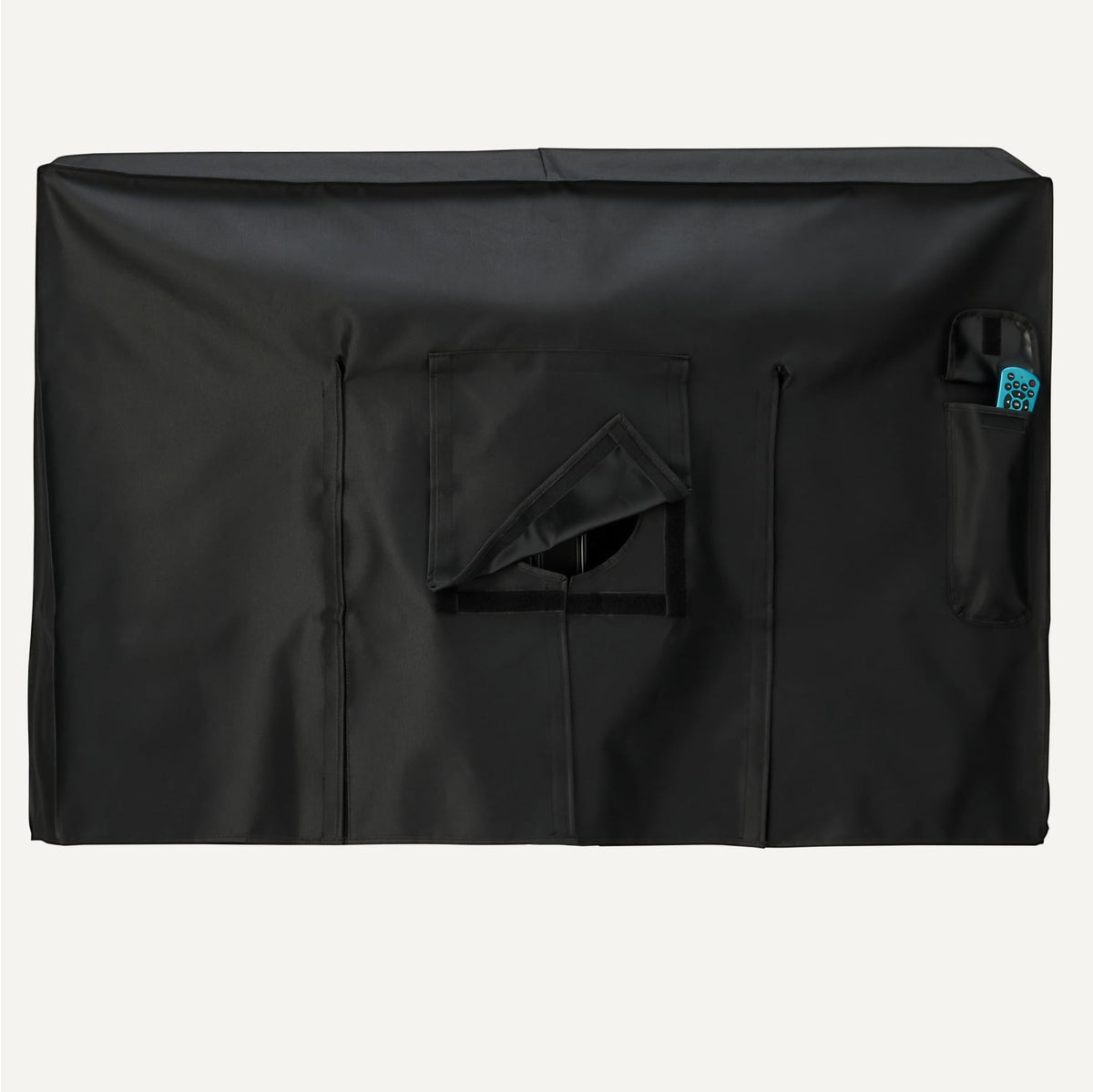 Amazon Basics protective cover on a mounted TV outdoors resists dust