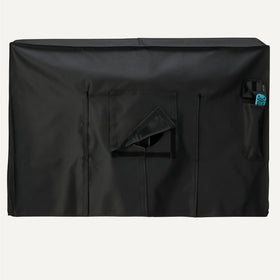 Amazon Basics protective cover on a mounted TV outdoors resists dust